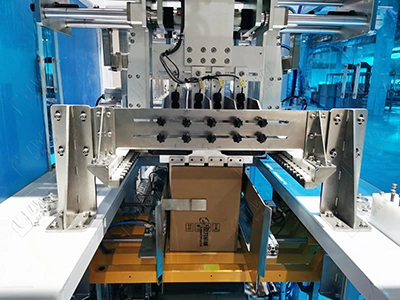 Side carton pressing mechanism