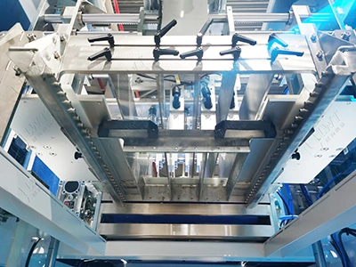 Side carton pressing mechanism